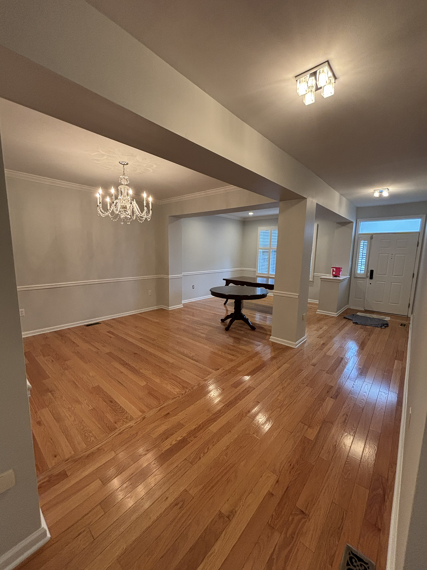 Detailed interior trim work with hand-brushed crown molding and door casings