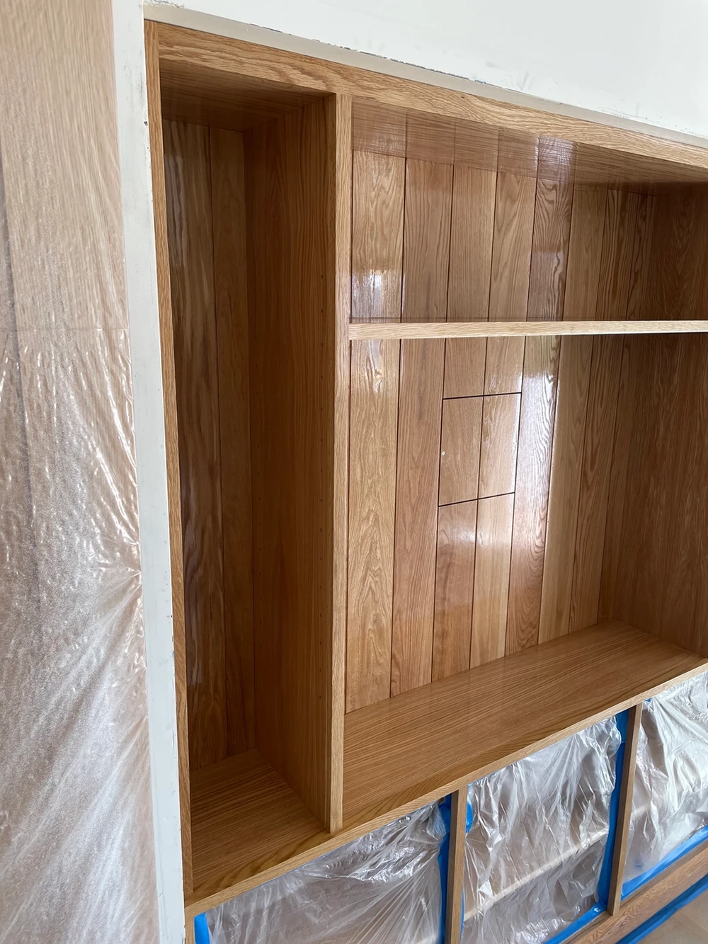 Refinished hardwood staircase with dark walnut stain and satin polyurethane finish
