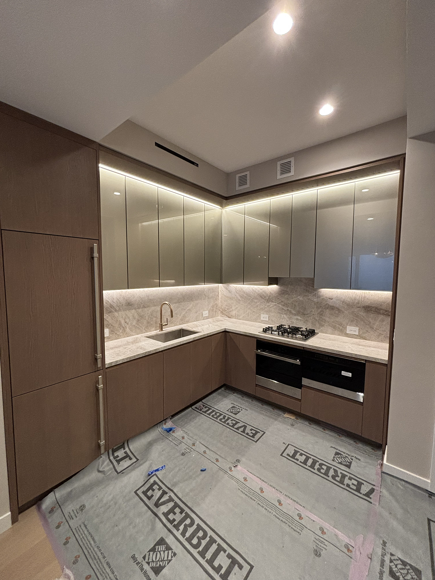 Executive suite interior with painted crown molding and accent wall