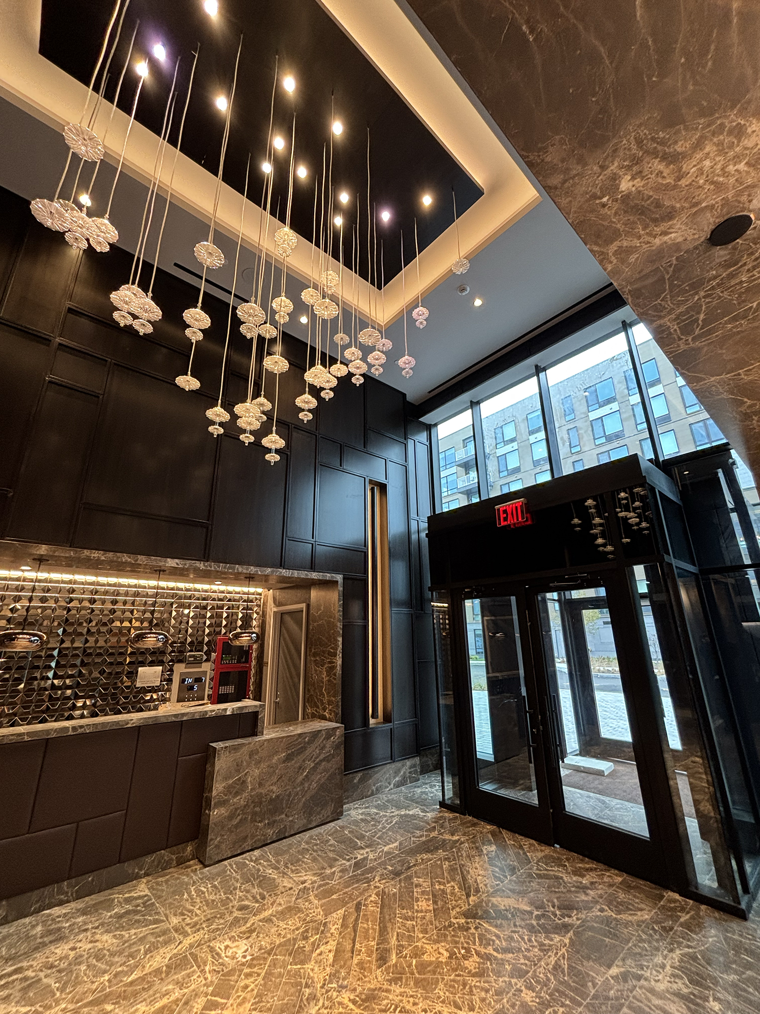 Commercial office interior repaint with clean white walls and painted structural columns