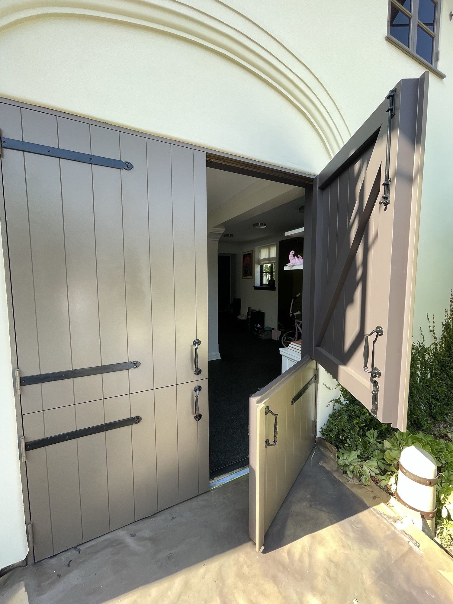 Elegant painted entryway with high-gloss door, painted sidelights, and hand-cut trim