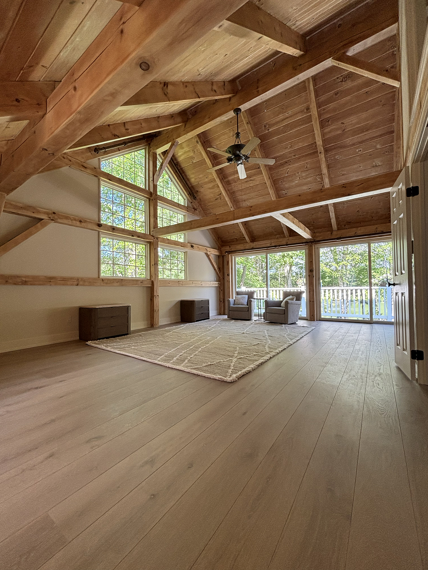 Stained interior door and casing with color-matched wood tone and hand-brushed finish